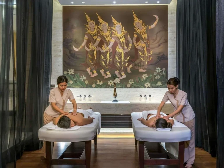 Indoor Spa Treatment Room with Dual Massage Tables and Decorative Mural in Ratchathewi Bangkok Indoor Spa Treatment Room with Dual Massage Tables and Decorative Mural in Ratchathewi Bangkok
