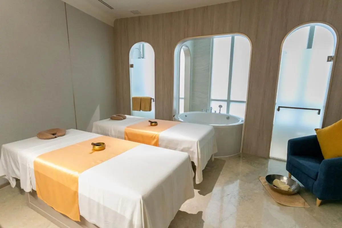 Indoor Spa Treatment Room with Jacuzzi and Massage Tables in Pathumwan Bangkok