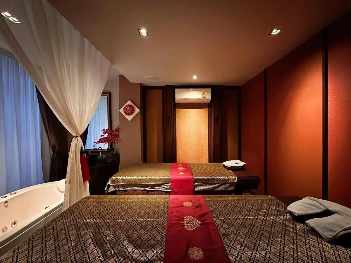 Chala Number6 Indoor Spa Treatment Room with Jacuzzi and Massage Tables in Phra Sing Chiang Mai