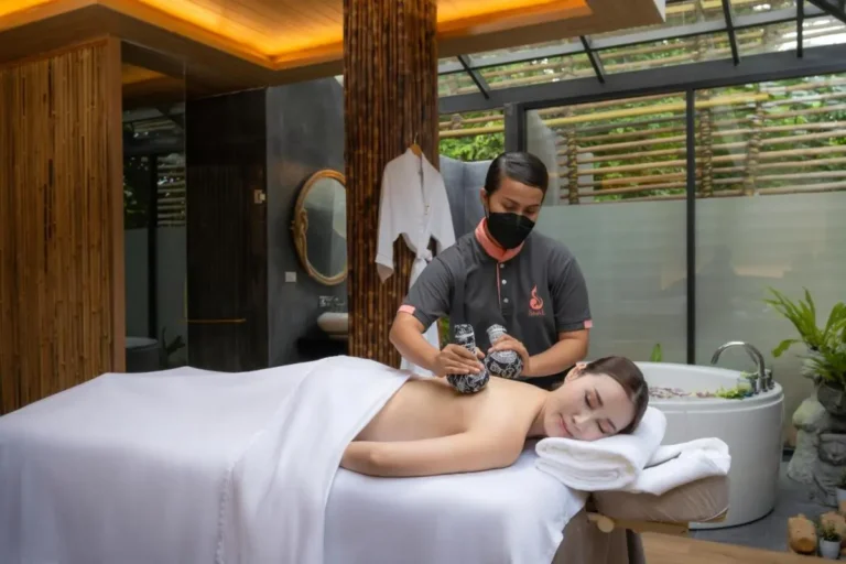 Indoor Spa Treatment Room with Massage Table and Relaxing Bathtub in Phuket Town