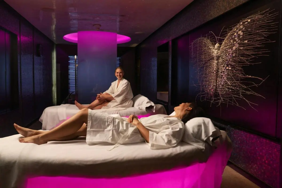 Indoor Spa Treatment Room with Massage Tables and Ambient Lighting in Bang Rak