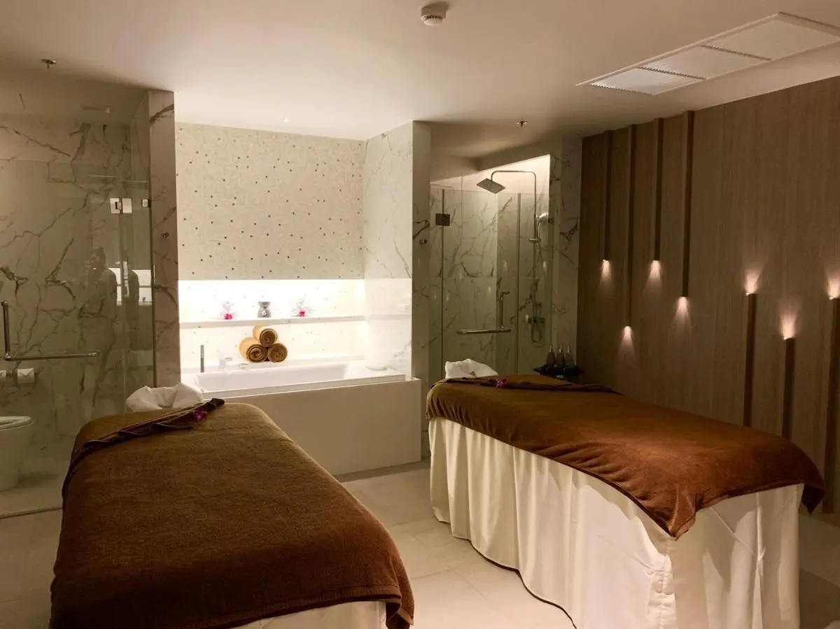Indoor Spa Treatment Room with Massage Tables Bathtub and Shower in Patong Beach