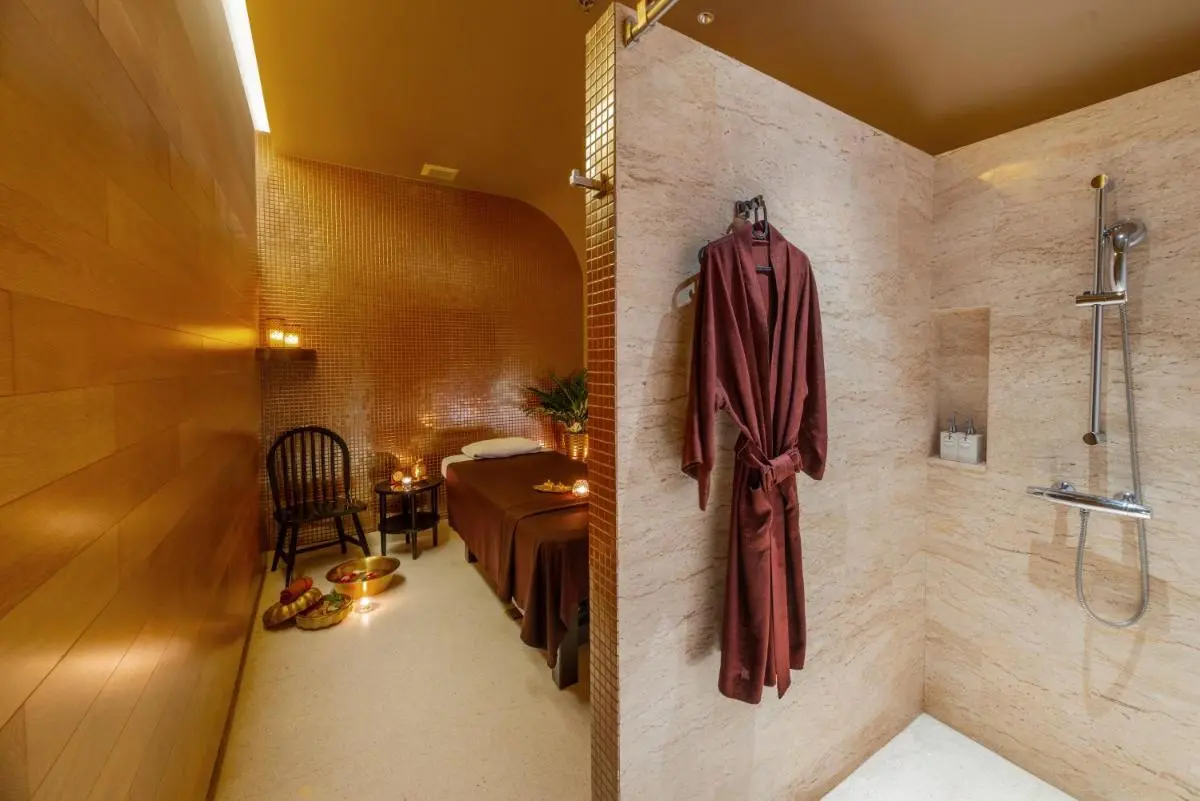 Indoor Spa Treatment Room with Shower and Massage Area in Pathumwan Bangkok