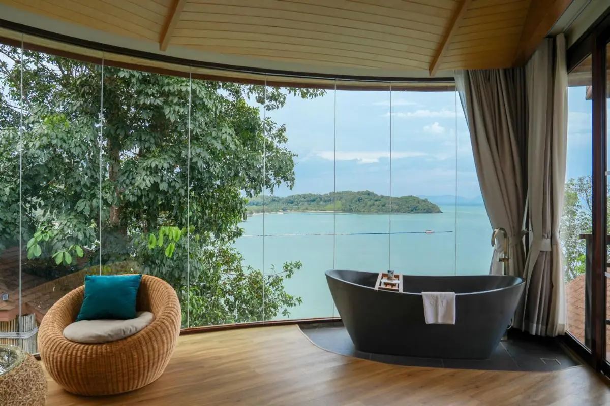 Indoor Space Featuring Modern Black Bathtub with Scenic Water View in Phuket Town