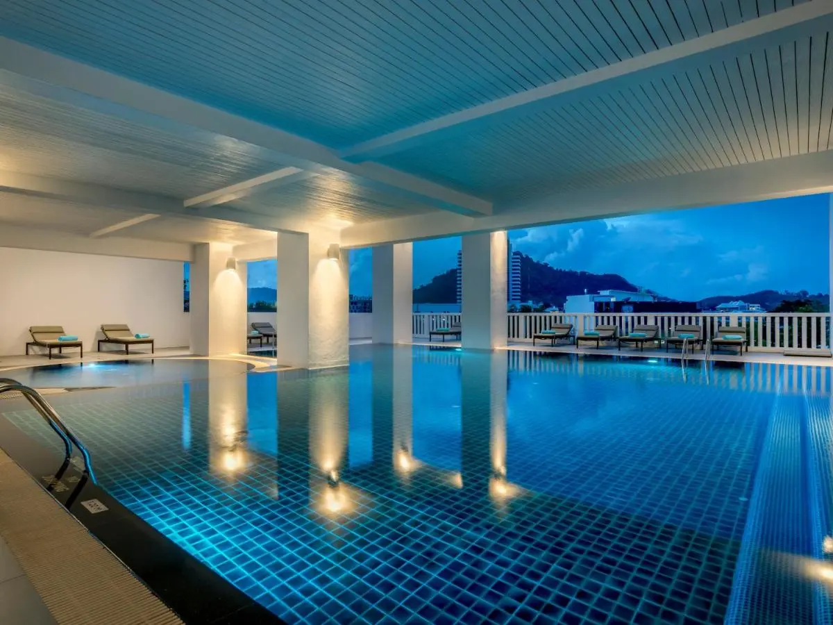 Indoor Swimming Pool and Jacuzzi Area with Scenic Views in Phuket Town