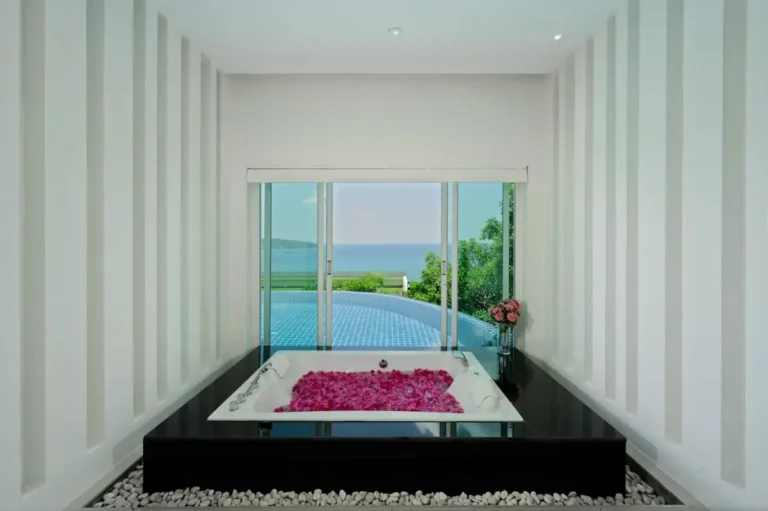 Indoor Wellness Area with Bathtub and Infinity Pool Overlooking Patong Beach