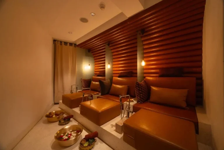 Indoor Wellness Area with Foot Soaking Basins and Leather Chairs in Pathumwan