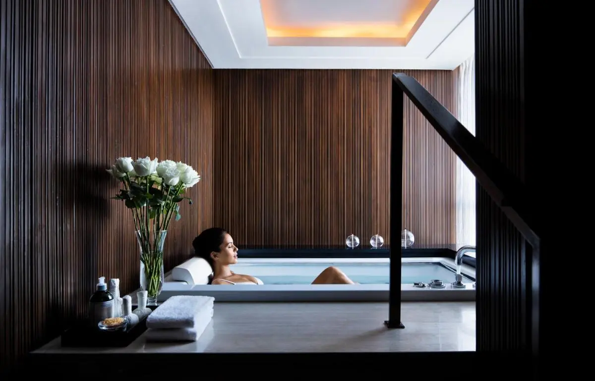 Sofitel Bangkok Sukhumvit Indoor Wellness Area with Marble Tub and Wooden Slat Walls in Wattana Bangkok