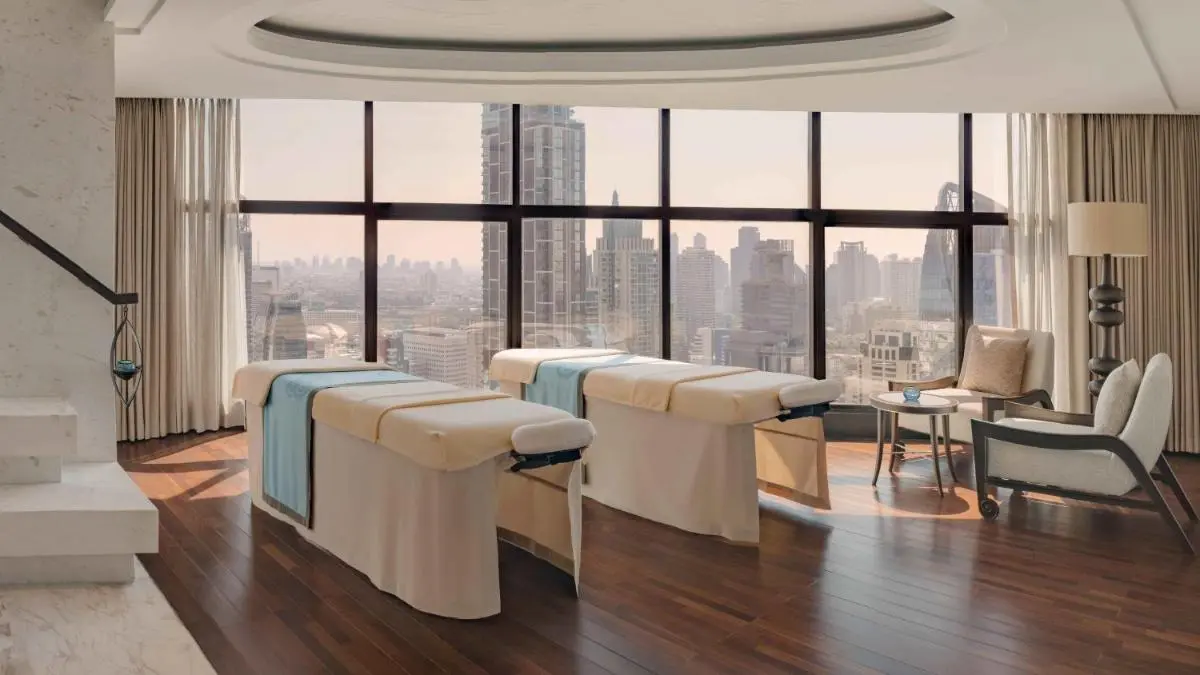 Indoor Wellness Room with Massage Tables and City Views in Pathumwan Bangkok
