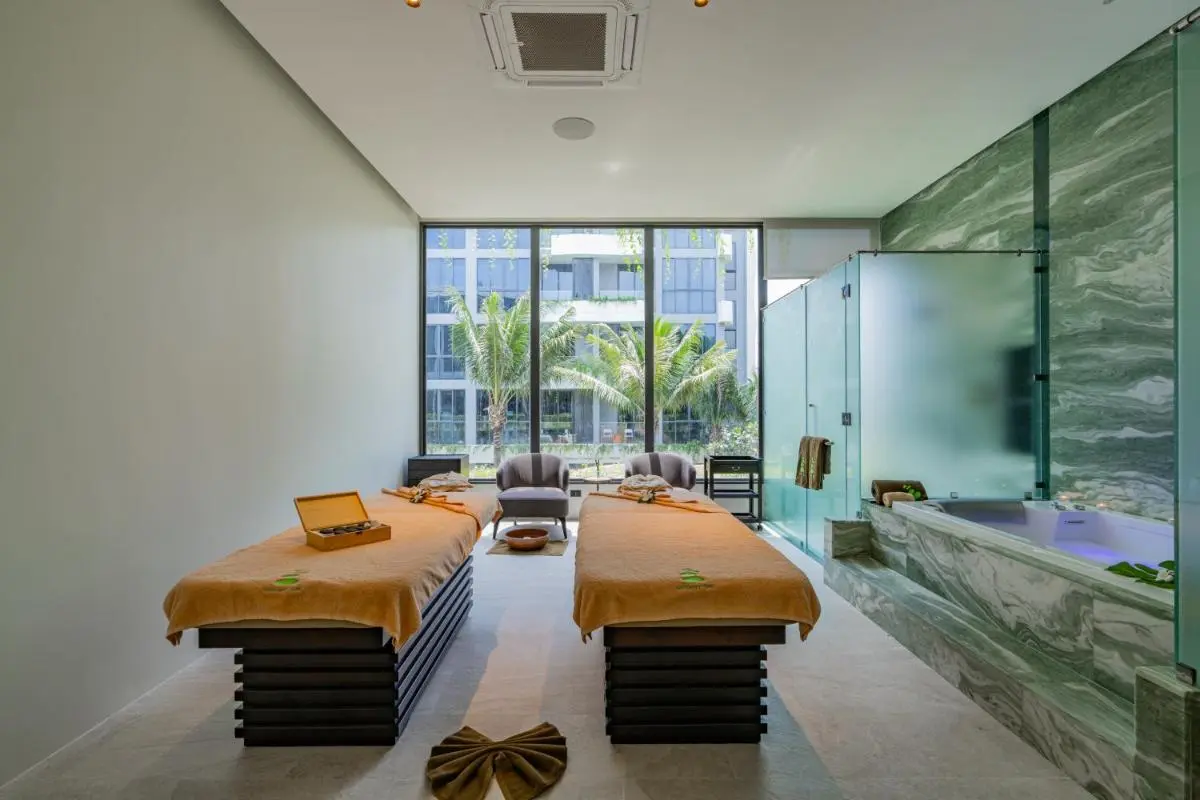 Indoor Wellness Room with Massage Tables and Marble Jacuzzi at Bang Tao Beach