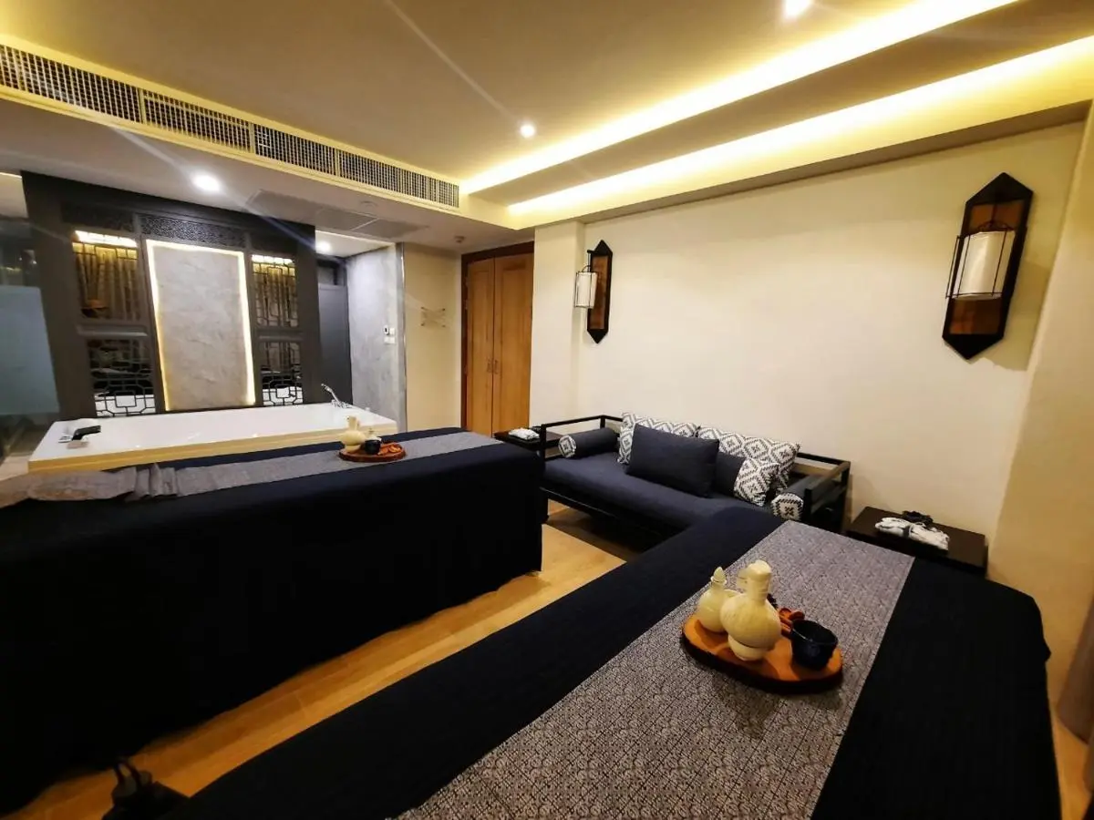 Indoor Wellness Room with Massage Tables and Soaking Tub in Chang Khlan Chiang Mai