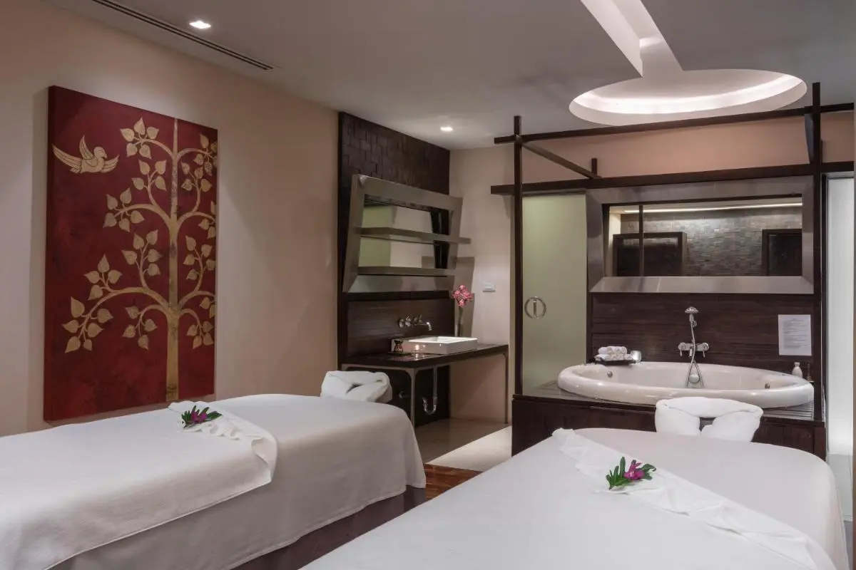 Indoor Wellness Room with Massage Tables and Whirlpool Jacuzzi in Bang Rak