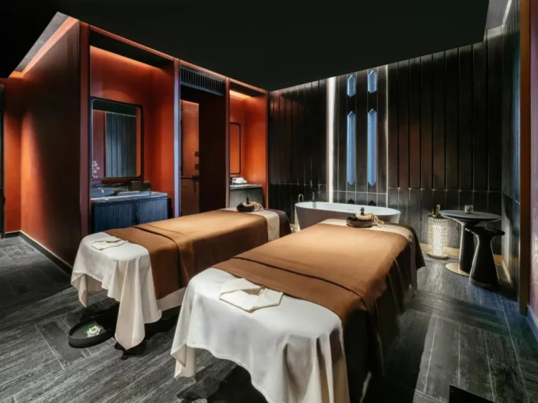 Indoor Wellness Spa Room with Massage Tables and Bathtub in Chang Khlan Chiang Mai