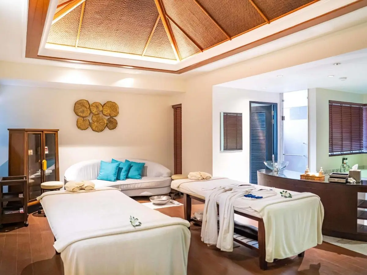 Indoor Wellness Spa Room with Massage Tables and Relaxing Ambiance at Panwa Beach