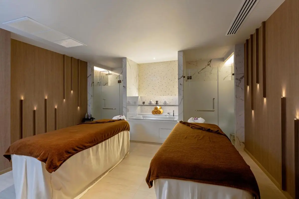 The Nature Phuket Indoor Wellness Treatment Room with Dual Massage Tables and Private Showers in Patong Beach