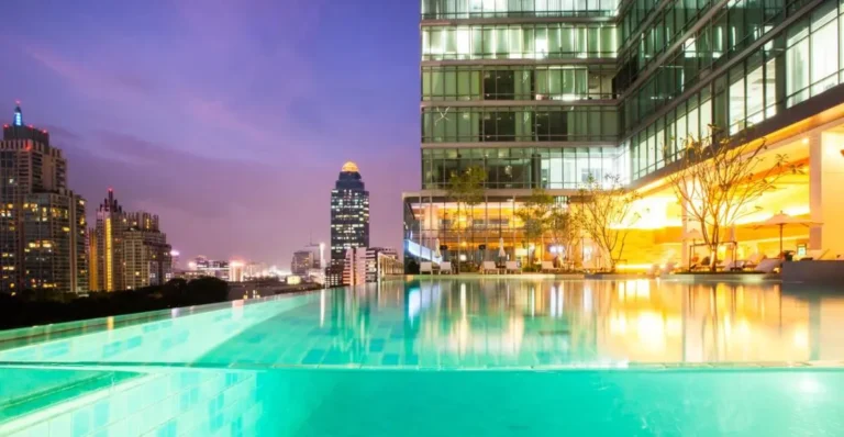 Infinity Pool and Relaxation Area with Cityscape Views in Pathumwan Bangkok