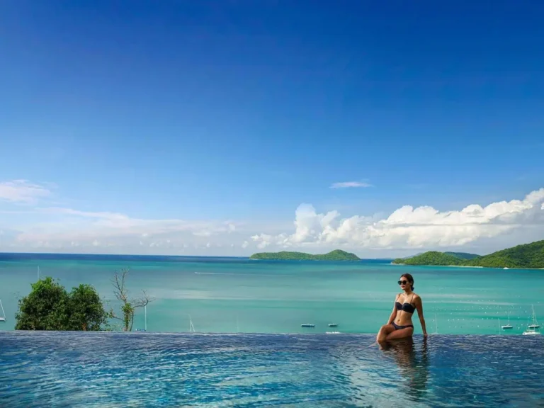 Infinity Pool Overlooking Turquoise Ocean and Forested Islands at Panwa Beach