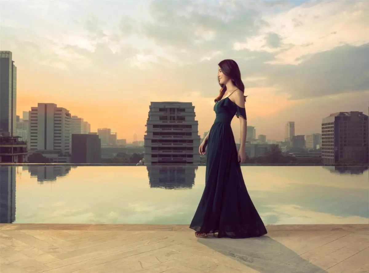 Infinity Pool with Cityscape Views and Sunset in Pathumwan Rooftop Setting
