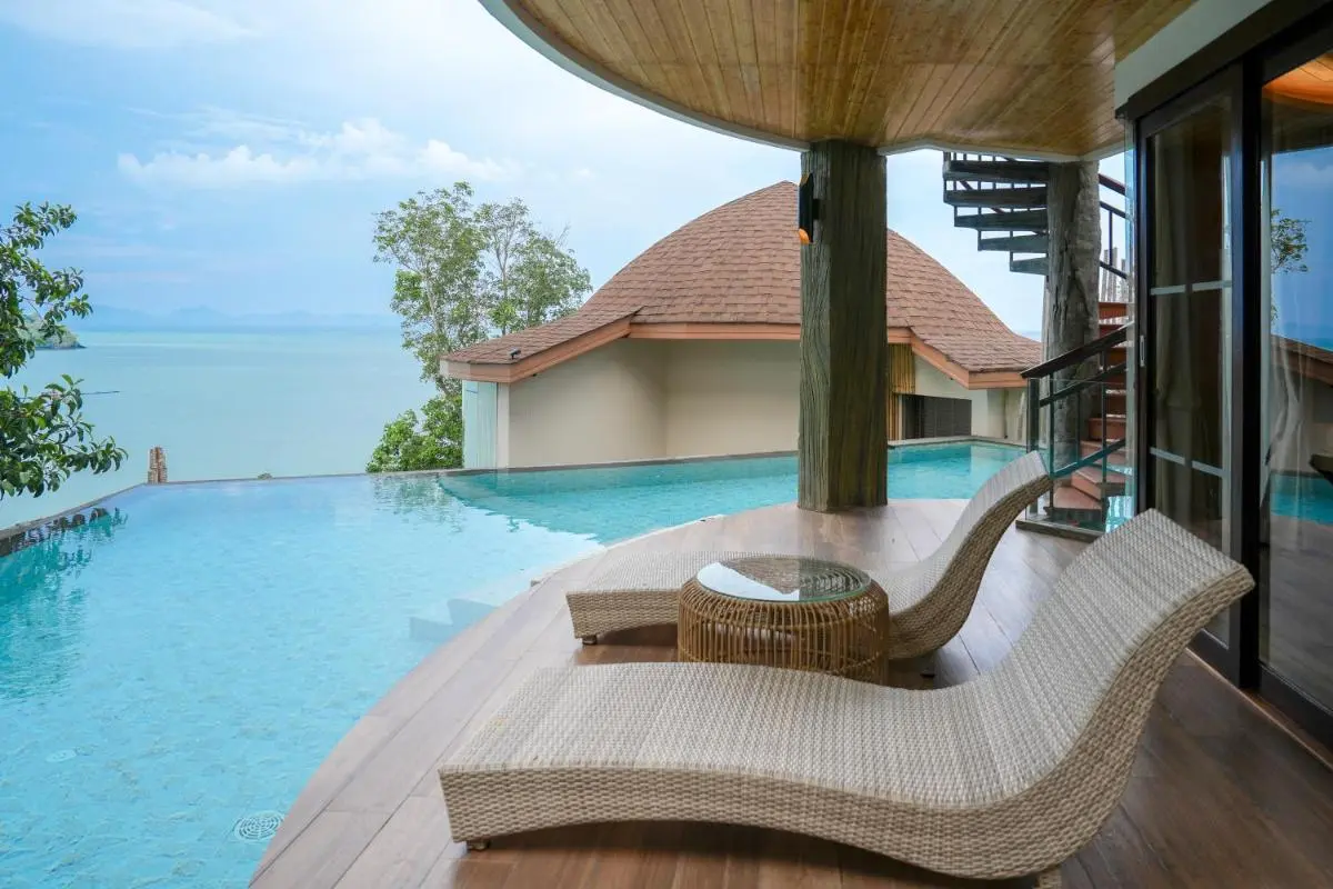 Infinity Pool with Ocean View and Spiral Staircase in Outdoor Deck Area Phuket Town
