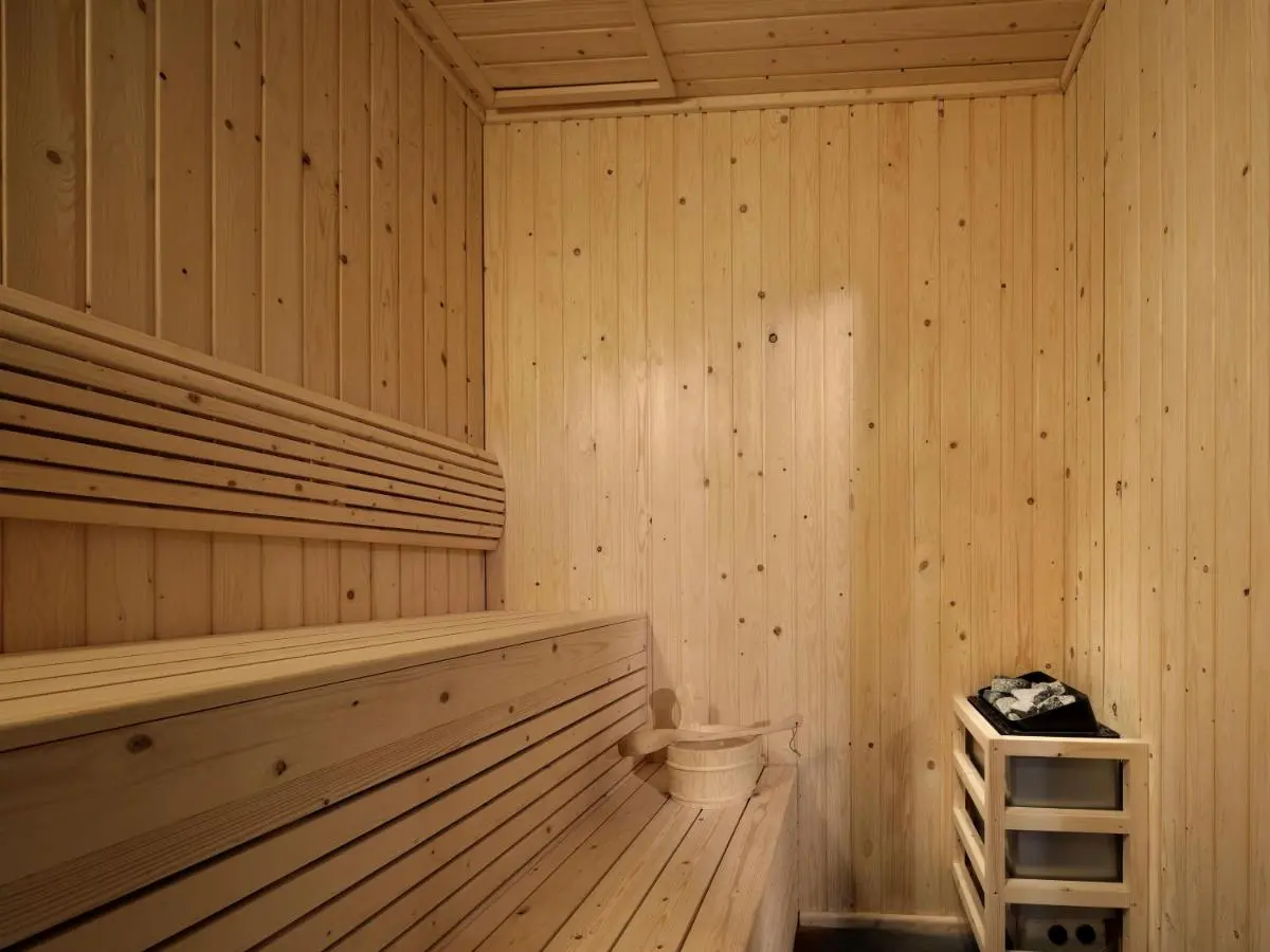 Grande Centre Point Surawong Bangkok Interior View of a Traditional Wooden Sauna Room with Heater in Bang Rak