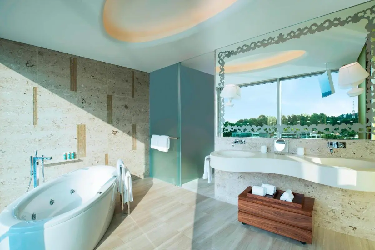 Jacuzzi Tub and Double Sink Vanity Bathroom with Natural Light in Sentosa Island