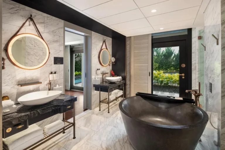 Luxury Bathroom with Black Bathtub and Marble Vanities in Sentosa Island