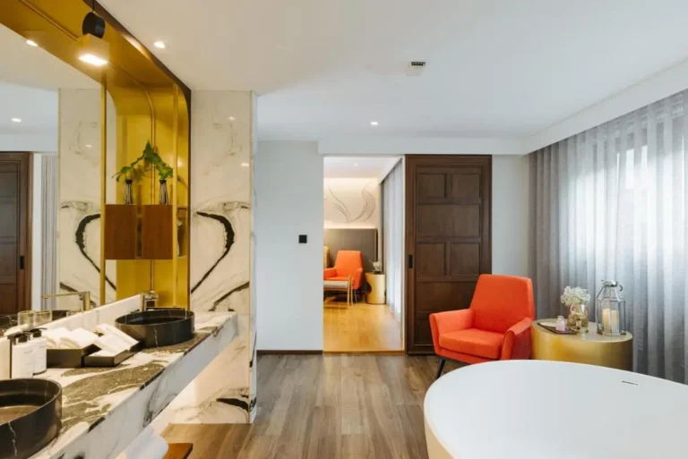 Modern Bathroom and Wellness Area with Freestanding Tub and Marble Countertop in Chiang Mai