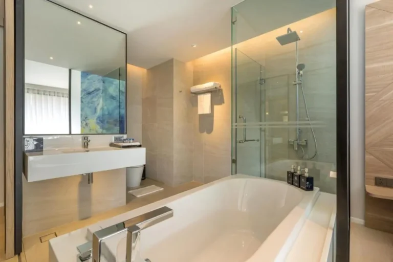 Modern Bathroom Design Featuring Bathtub and Glass-Enclosed Shower in Patong Beach Modern Bathroom Design Featuring Bathtub and Glass-Enclosed Shower in Patong Beach