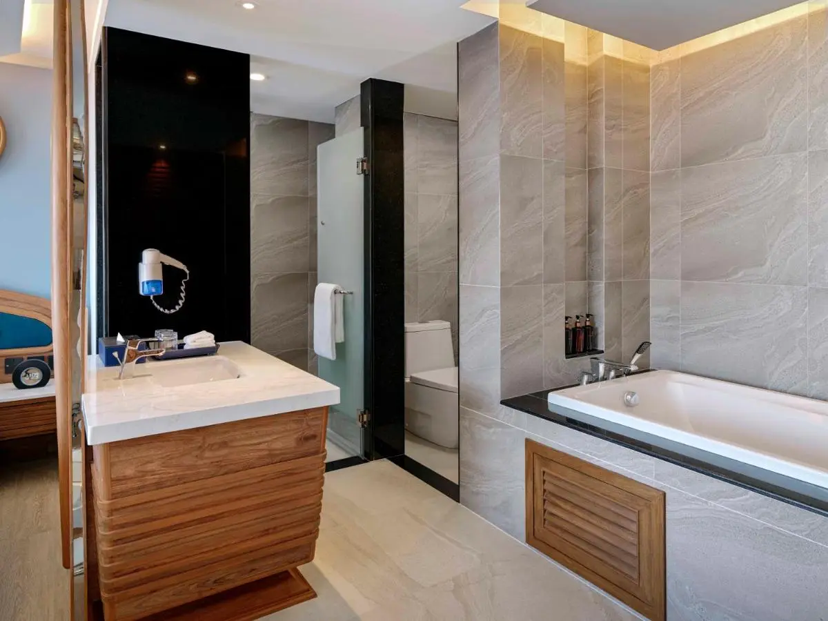 Thailand Modern Bathroom Design Featuring Bathtub and Wooden Vanity in Phuket Town