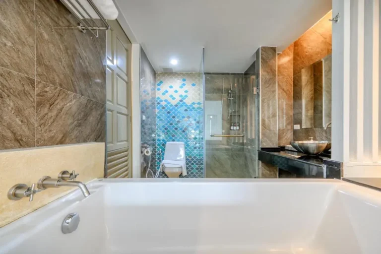 Modern Bathroom Design Featuring Bathtub, Shower, and Vessel Sink in Patong Beach