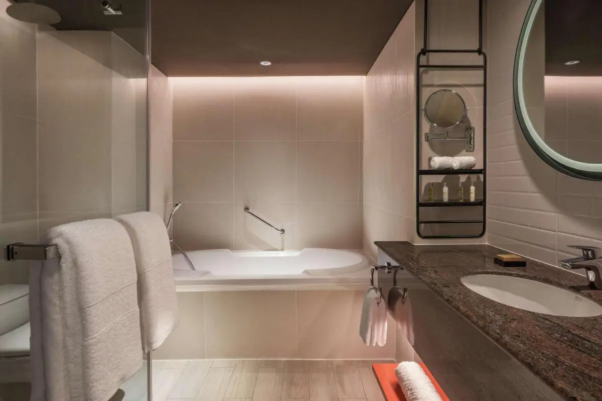 Modern Bathroom Design Featuring Built-In Bathtub and Spa Elements in Khlong Toei