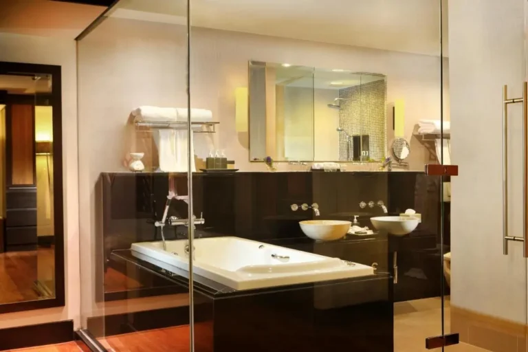 Modern Bathroom Design Featuring Built-In Whirlpool Bathtub and Double Vessel Sinks