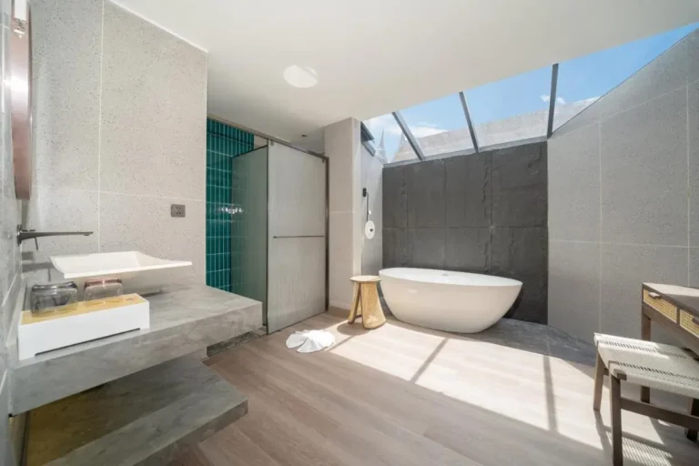 Modern Bathroom Design Featuring Freestanding Bathtub and Glass-Enclosed Shower in Thalang