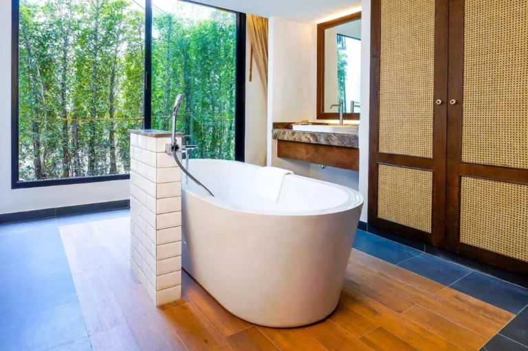 Modern Bathroom Design Featuring Freestanding Bathtub and Natural Elements in Chiang Mai