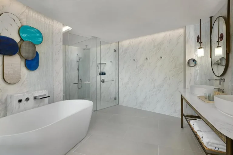 Modern Bathroom Design Featuring Freestanding Tub and Glass-Enclosed Shower at Panwa Beach
