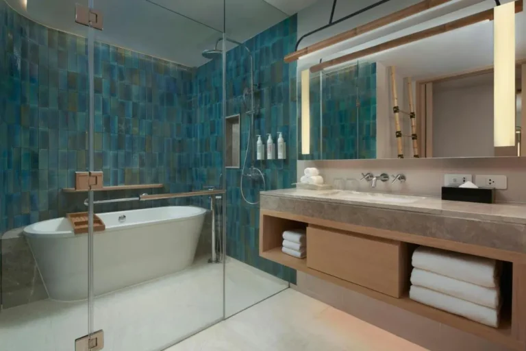Modern Bathroom Design Featuring Freestanding Tub and Glass Shower Enclosure at Mai Khao Beach