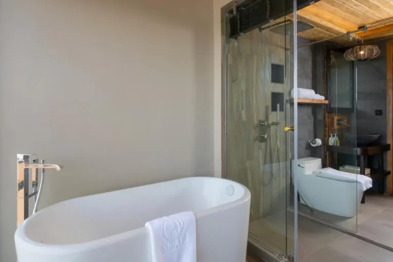 Modern Bathroom Design Featuring Freestanding Tub and Glass Shower Enclosure in Phuket Town