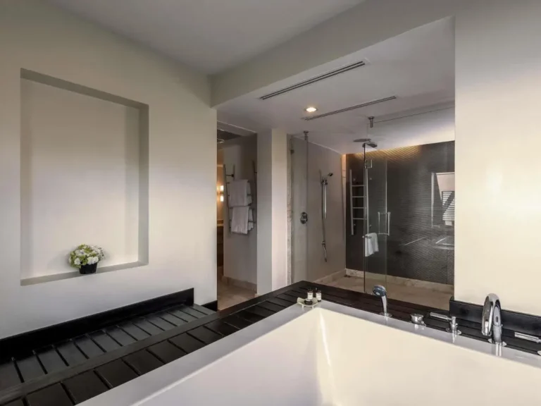 Modern Bathroom Design Featuring Large Bathtub and Walk-In Shower at Panwa Beach