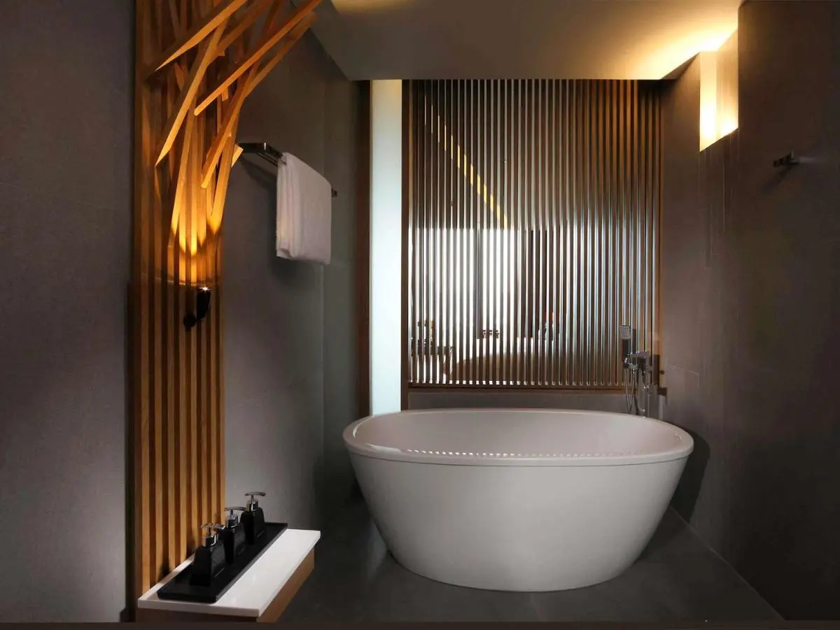Modern Bathroom Design with Freestanding Bathtub and Wooden Accents in Bang Rak