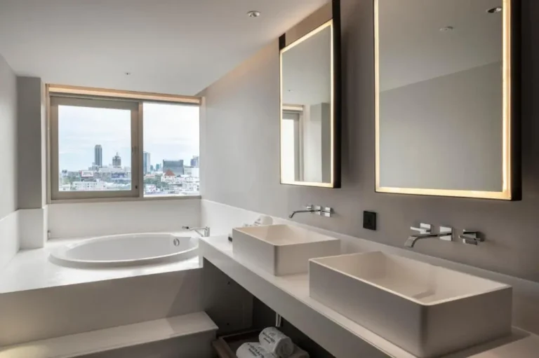 Modern Bathroom Design with Oval Bathtub and Dual Sinks in Khlong Toei Bangkok