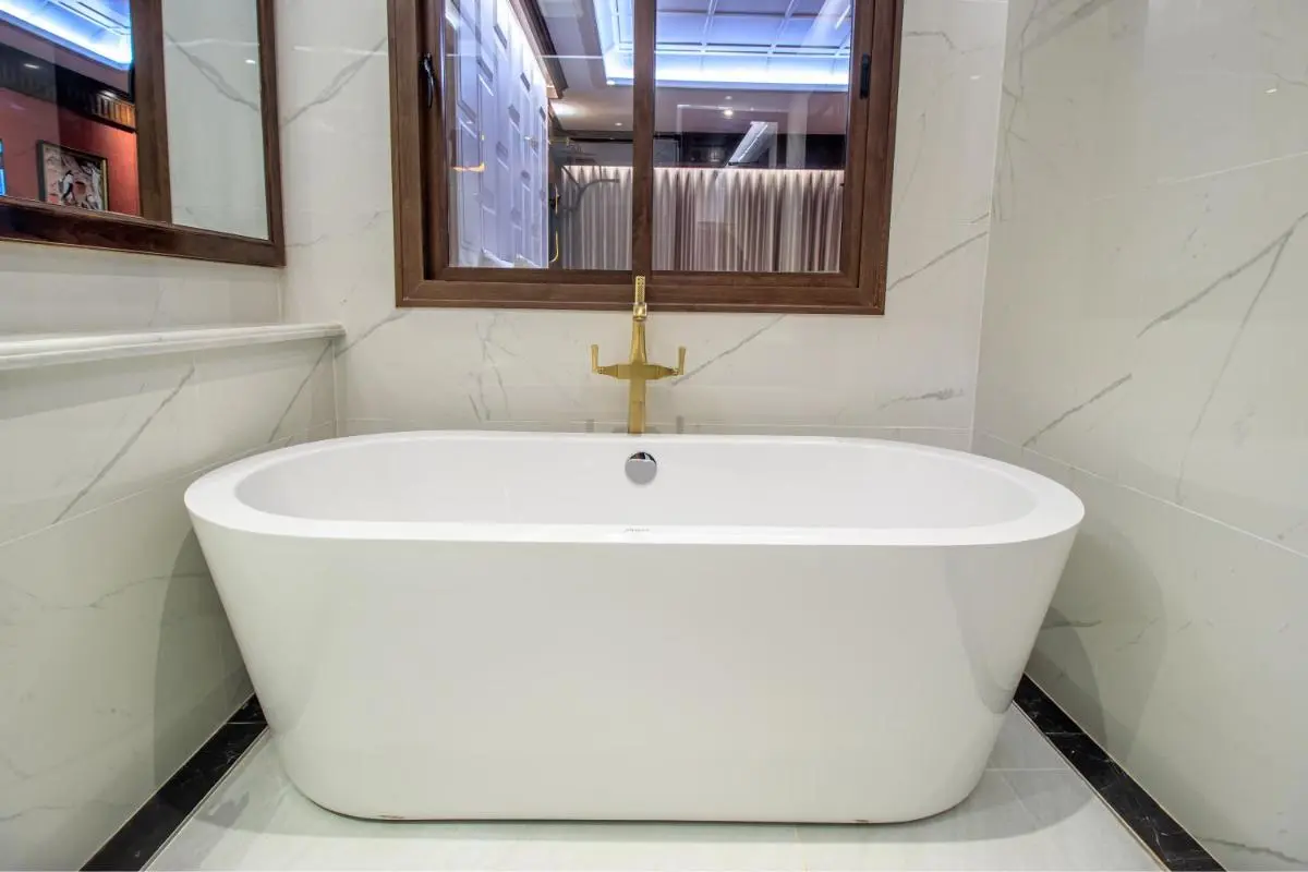 Modern Bathroom Design with Standalone Bathtub and Gold Faucet in Fa Ham Chiang Mai