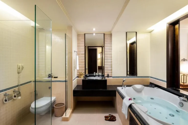Modern Bathroom Featuring Built-In Jacuzzi Tub and Glass-Enclosed Shower in Patong Beach