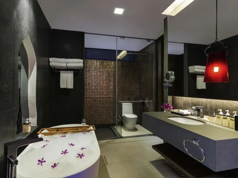 Modern Bathroom Featuring Freestanding Tub and Glass-Enclosed Shower at Patong Beach