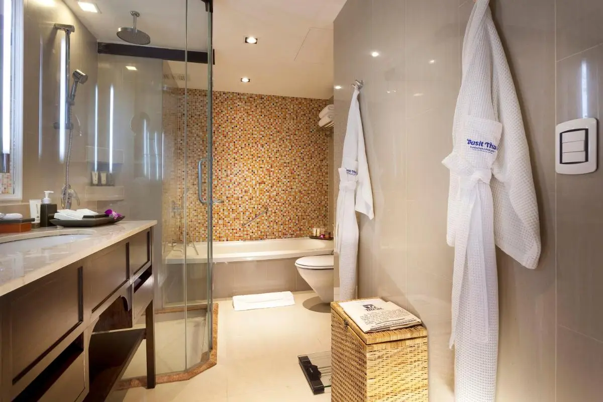 Modern Bathroom Featuring Shower Bathtub Combo and Mosaic Tile Backsplash at Bang Tao Beach