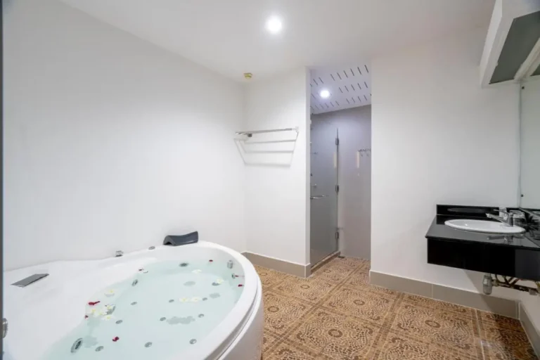 Modern Bathroom Featuring Whirlpool Bathtub and Glass-Enclosed Shower at Rawai Beach