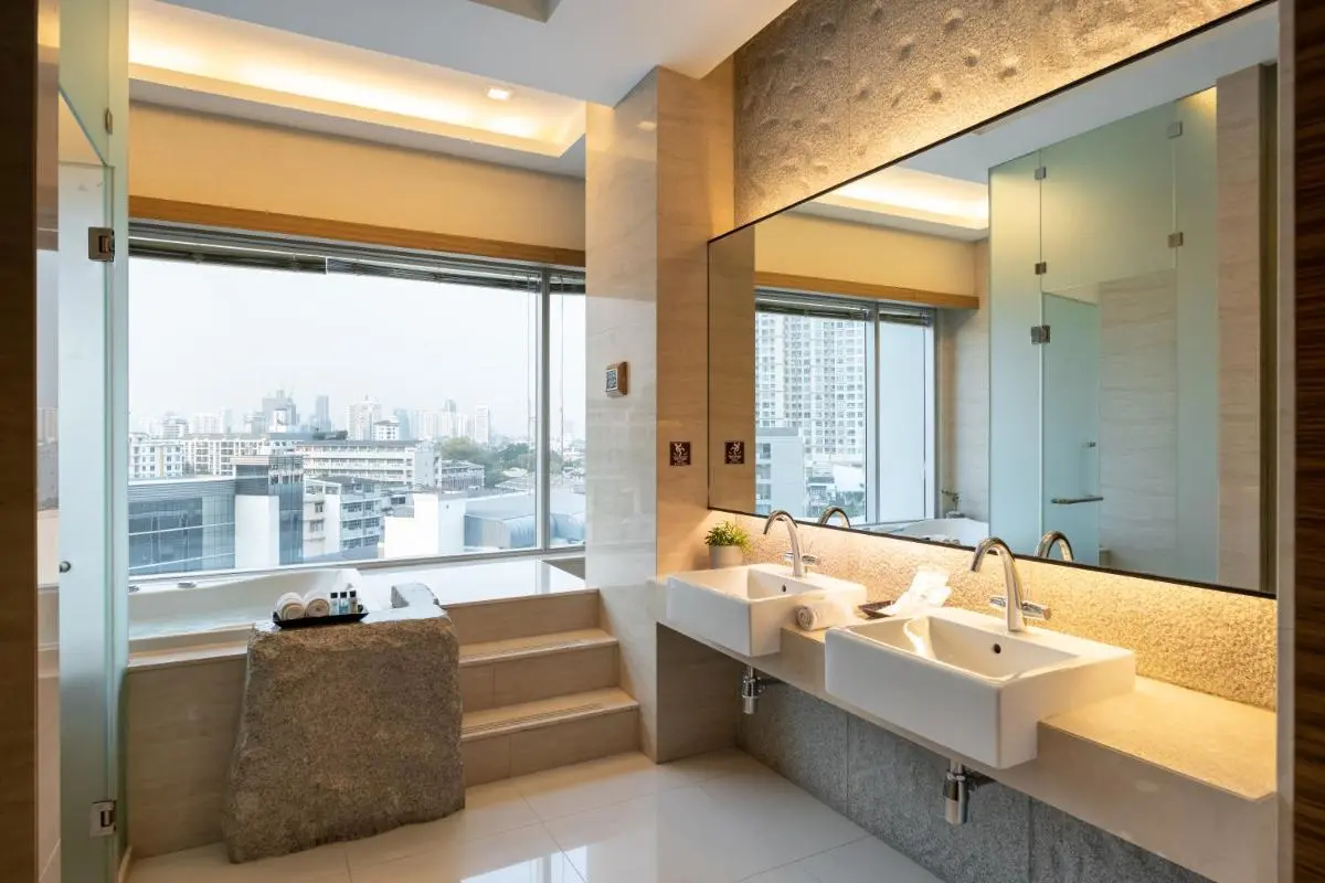 Modern Bathroom with Built-In Bathtub and City View in Wattana Bangkok