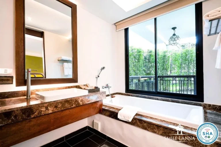 Modern Bathroom with Built-In Bathtub and Natural Light in Hai Ya Chiang Mai