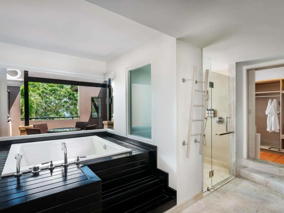 Pullman Phuket Panwa Beach Resort Modern Bathroom with Built-In Bathtub and Outdoor Seating at Panwa Beach Phuket Province