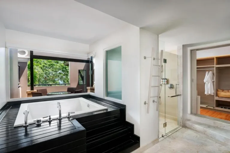 Modern Bathroom with Built-In Bathtub and Outdoor View at Panwa Beach