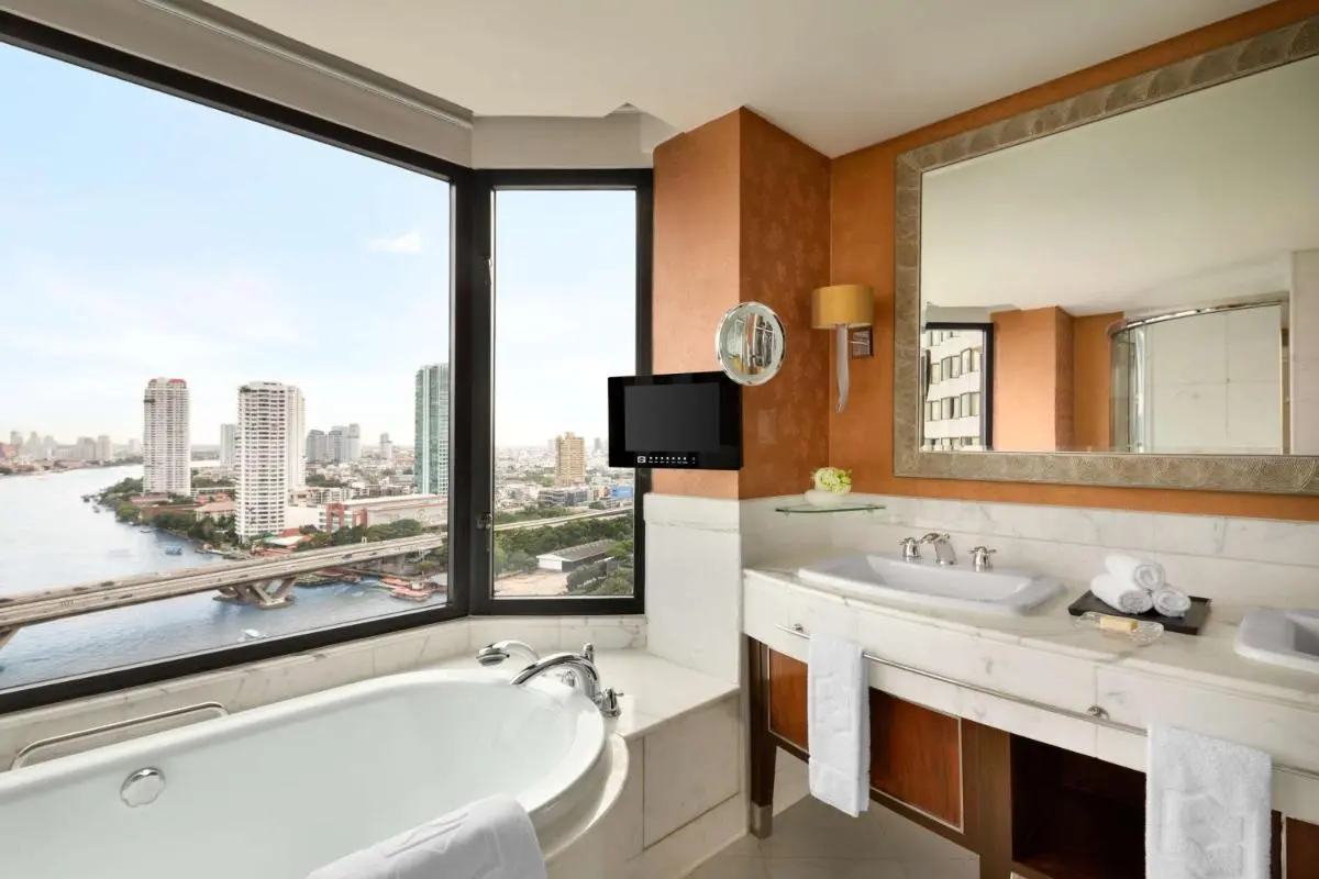 Modern Bathroom with Corner Bathtub and City Views in Bang Rak Bangkok